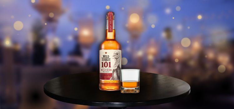 Wild Turkey 101 on table with glass