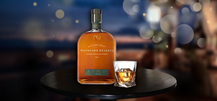 Woodford Reserve with glass on table