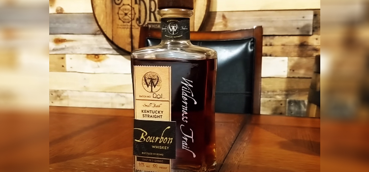 Wilderness Trail Bottled-In-Bond Small Batch Bourbon on top of a wooden table