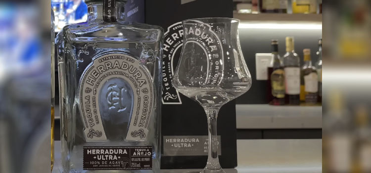 Bottle of Herradura with Glass and a Box
