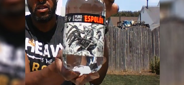 Man Holding Bottle of Espolòn Blanco