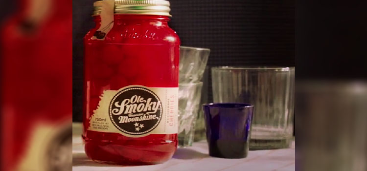 Jar of Ole Smoky Moonshine Cherries and a Glasses